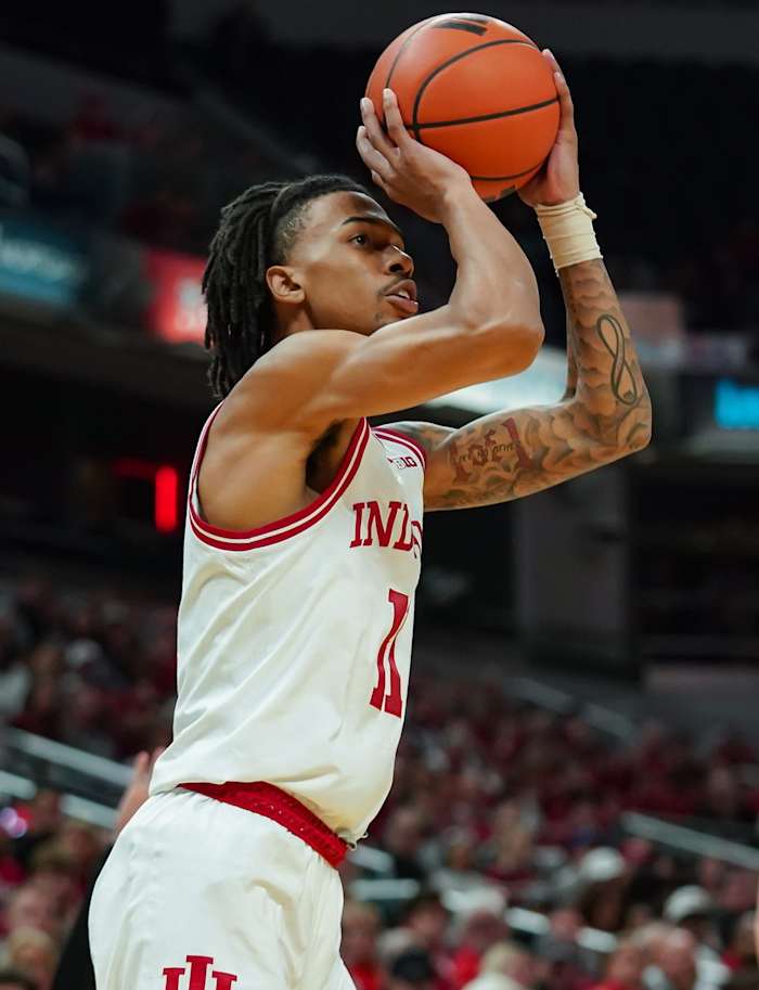 Indiana Hoosiers guard CJ Gunn (11) attempts a shot during the game against Harvard in Gainbridge Fieldhouse.